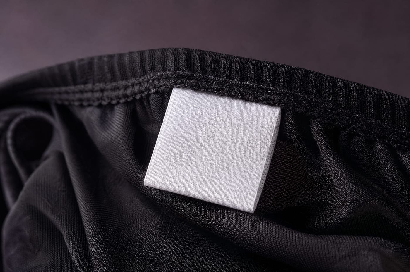 Photograph of the sewn-in fibre composition label for Semi 40 Curve